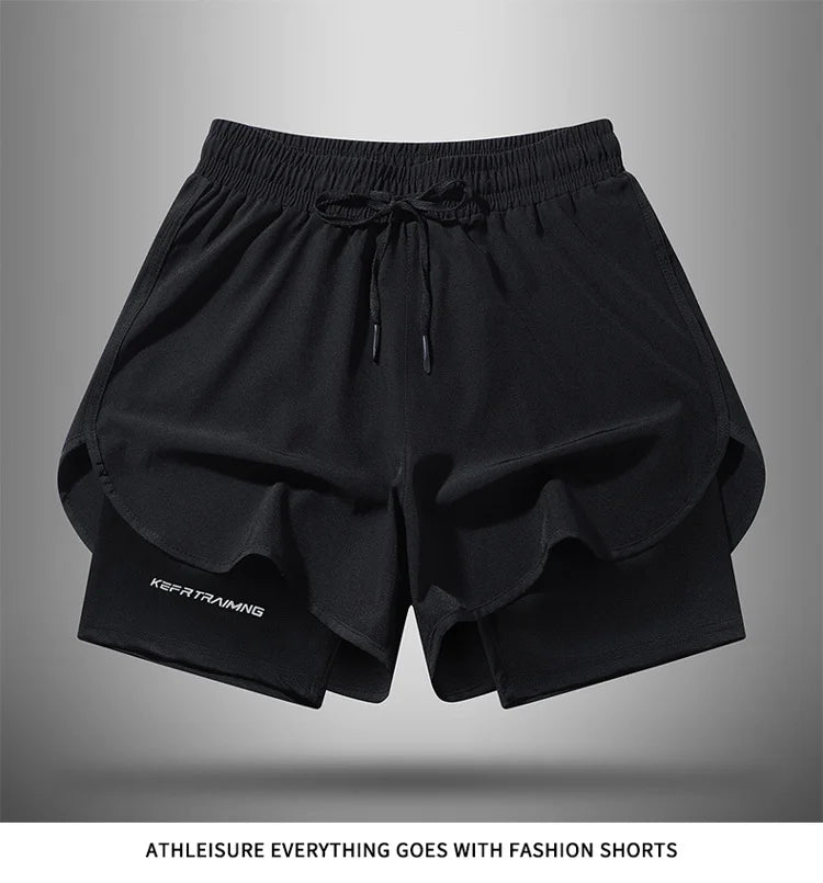 Black men's quick-dry athletic shorts laid flat on a gray background