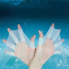 A hand is shown wearing silicone swim training flippers, with water droplets visible around the fingers.