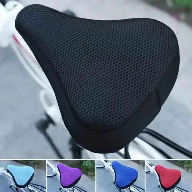 A collection of bicycle saddle cushions in various colors including blue, purple, and red, showing different mesh textures.