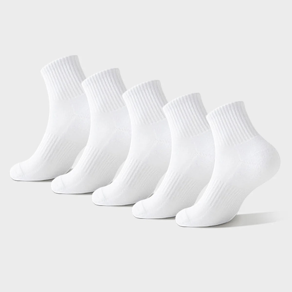 A row of white athletic crew socks displayed against a light background.