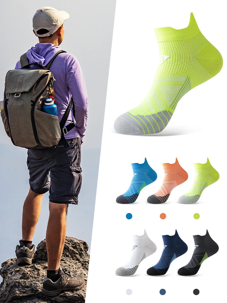 A variety of breathable anti-blister running socks in various colors and patterns displayed next to a person wearing athletic