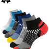 A collection of six pairs of colorful athletic knit ankle socks displayed together.