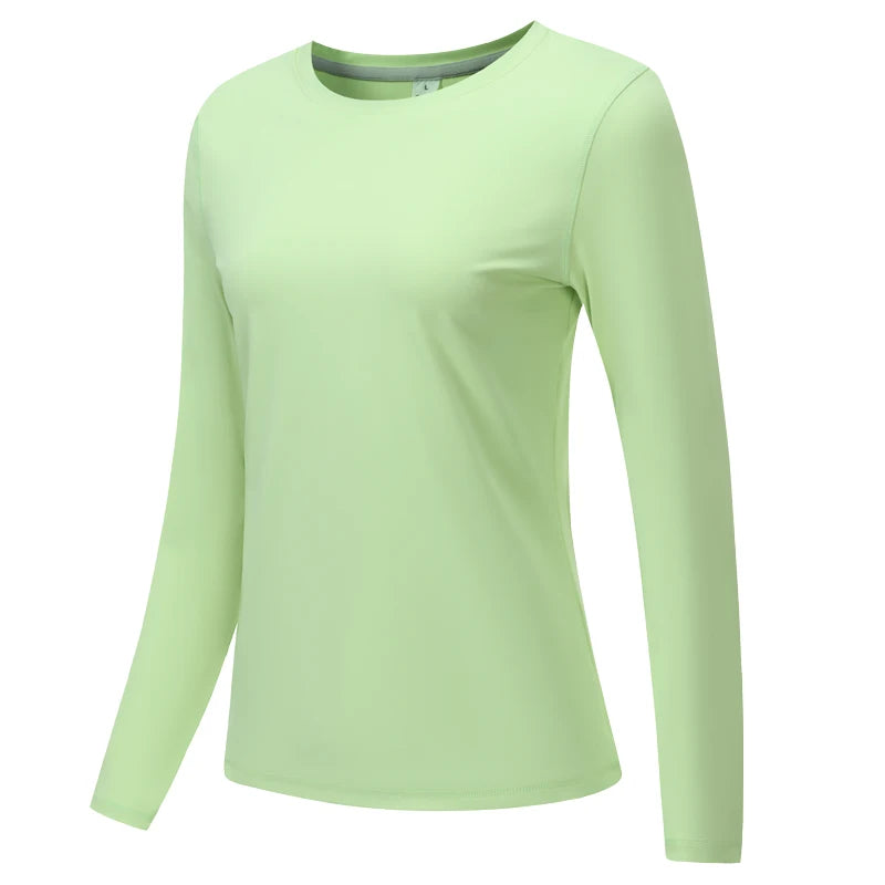 Una camiseta deportiva de manga larga verde claro para yoga o correr.