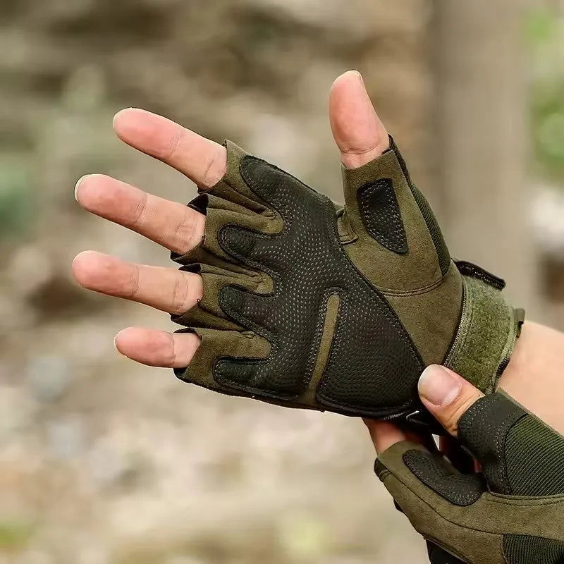 A hand is holding a pair of olive green and black universal protective training gloves.