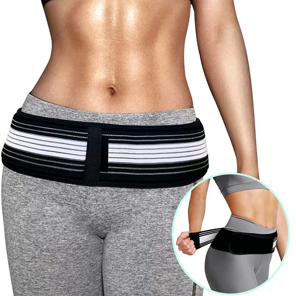 A woman wearing a black and white pelvic support hip belt for lower back and SI joint relief around her waist.