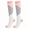 A pair of pink and white striped compression elastic socks for sports and daily wear