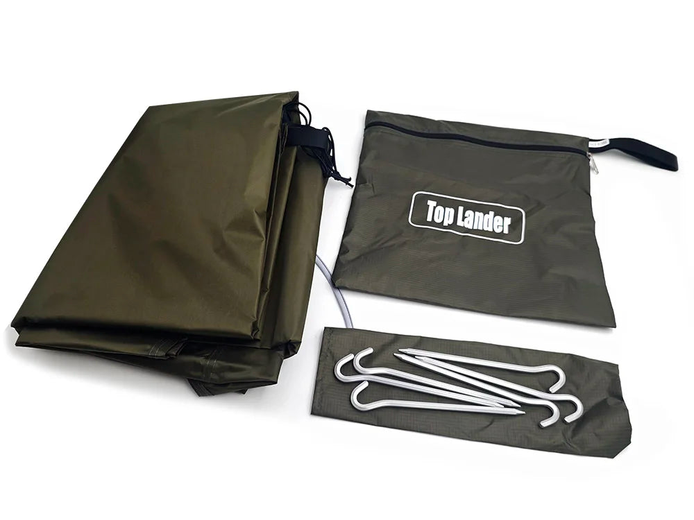 A dark olive green waterproof camping ground mat is shown folded and a separate flat mat with metal tools is displayed.