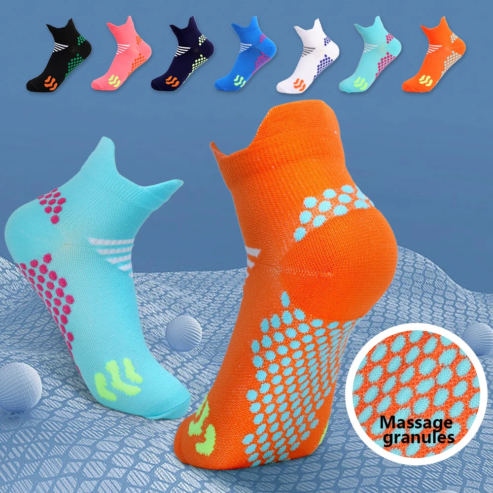 A variety of colorful massage and compression running socks are displayed against a blue background.