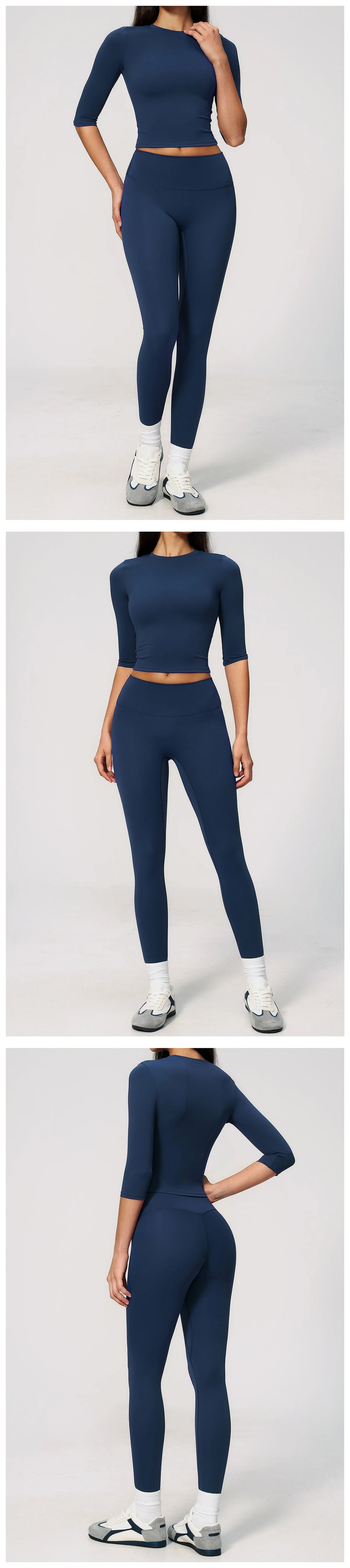 A woman models a navy blue yoga and fitness leggings set, featuring long sleeves and high-waisted pants.