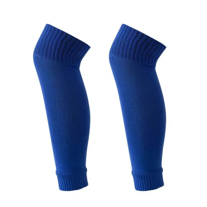 A pair of royal blue compression football socks for athletes, shown vertically.
