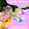 Pink and blue kids goggles are shown in use outdoors with a child wearing them.