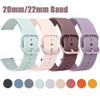 A set of five silicone watch straps in various pastel colors, including light blue, pink, mauve, and purple.