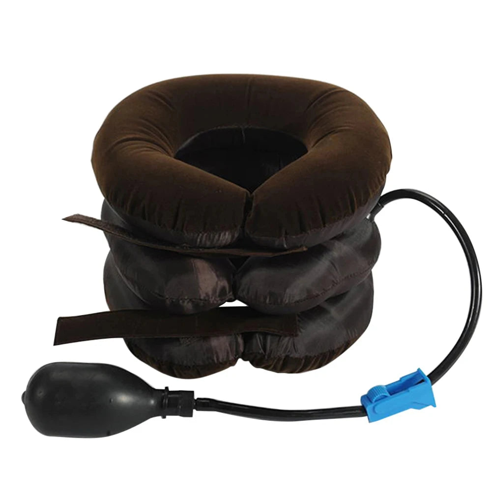 A dark brown inflatable cervical traction stretcher with a black hose and blue connector.