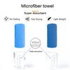 Blue microfiber towel demonstrating water absorption and features like no fading, fast drying, and light weight.
