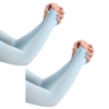 A pair of light blue ice silk arm sleeves being held together by their hands.