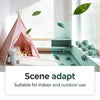 A pink tent with stuffed animals is shown in a bright room, demonstrating the scene adapt feature for indoor and outdoor use.