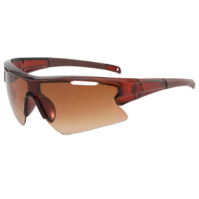 Brown tinted sports sunglasses with a tortoiseshell frame shown from the side.