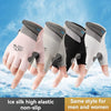 A pair of light pink and gray ice silk non-slip gloves shown on a hand against a snowy background.