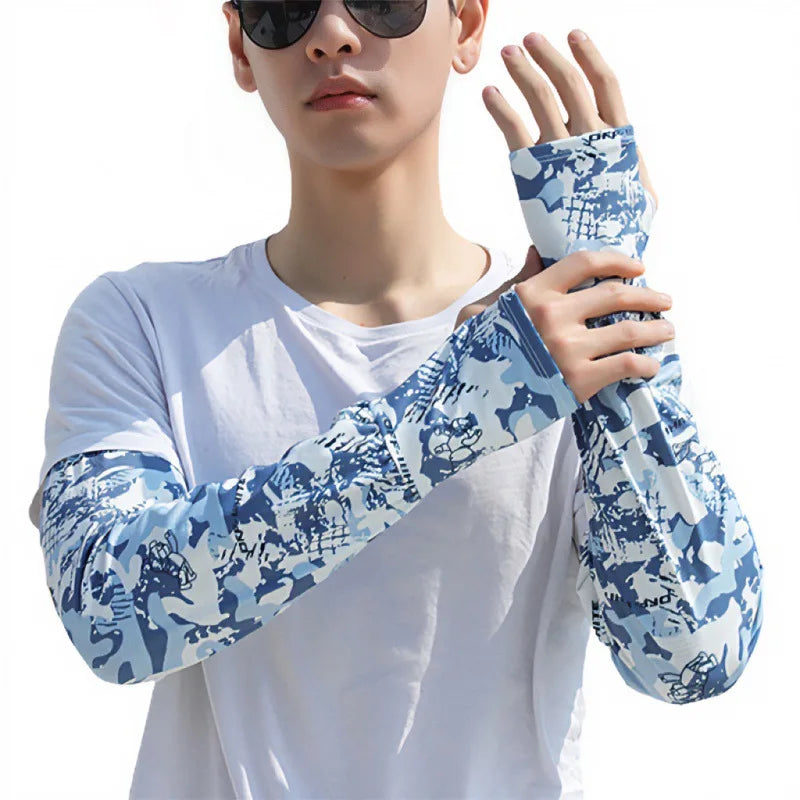 Person in white shirt with blue patterned UV protection loose sleeves on the right arm.