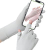A hand wearing a light gray glove is touching a smartphone screen, demonstrating the flap design of a sensitive touchscreen.