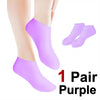 One pair of purple silicone moisturizing socks shown on a foot and separate for display.