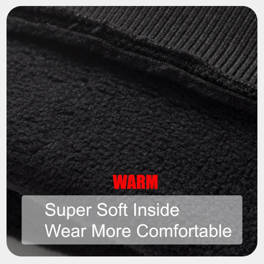 Close-up of a black knitted garment labeled as warm with text indicating super soft inside for increased comfort.