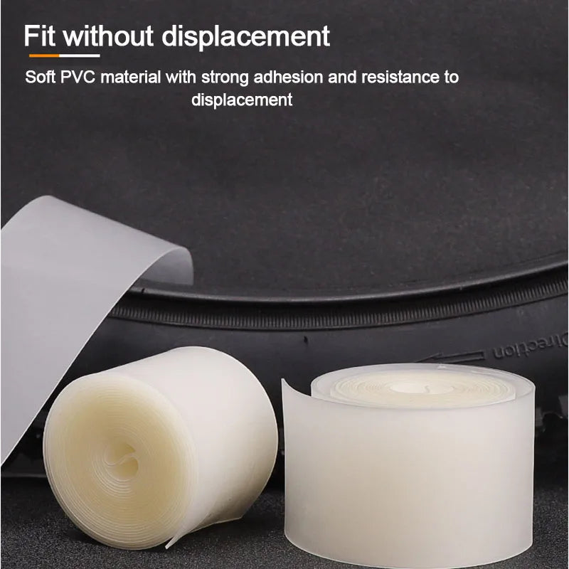 Rolls of soft PVC bicycle puncture protection liner material shown on a dark surface.
