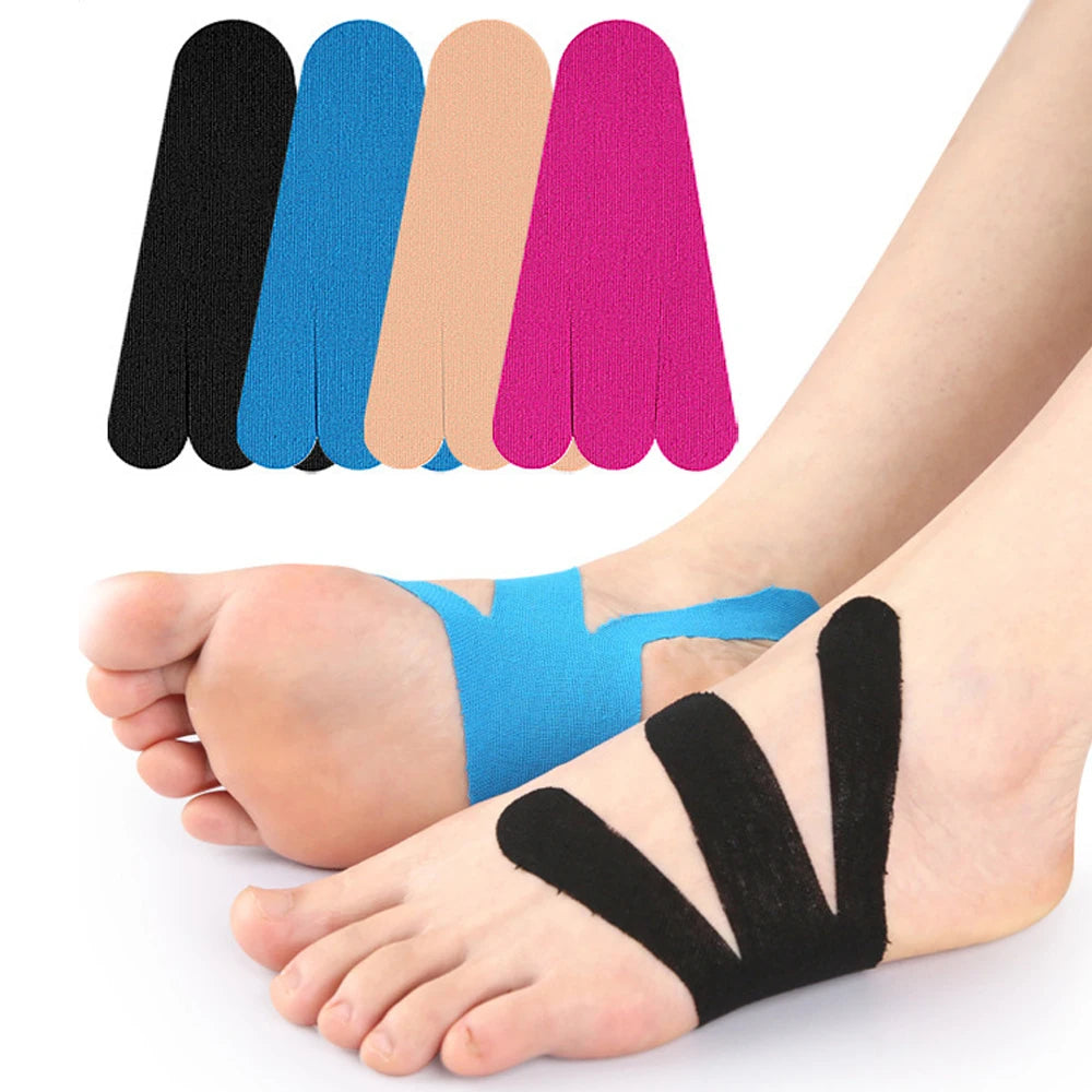 A set of colorful precut kinesiology tape strips for foot and joint support shown on a person's foot.