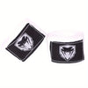 A pair of black and white professional cotton boxing hand wraps.