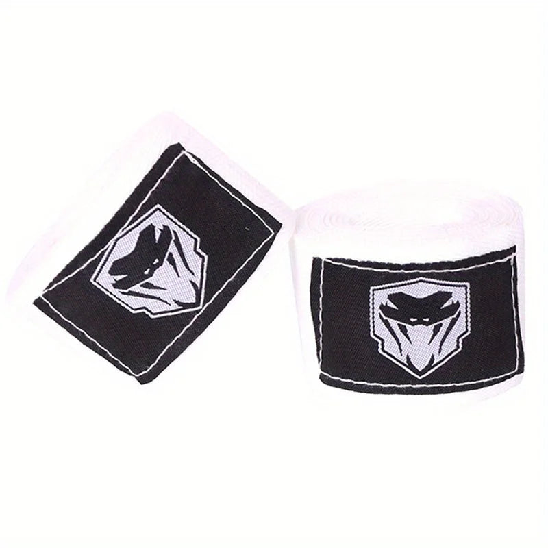 A pair of black and white professional cotton boxing hand wraps.