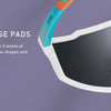 Adjustable nose pads on a pair of sports sunglasses with a non-slip design.