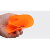 An orange soccer training disc cones set being held in a hand.