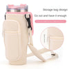 A beige adjustable water bottle carrier pouch with a pink strap and zipper closure for convenient storage.