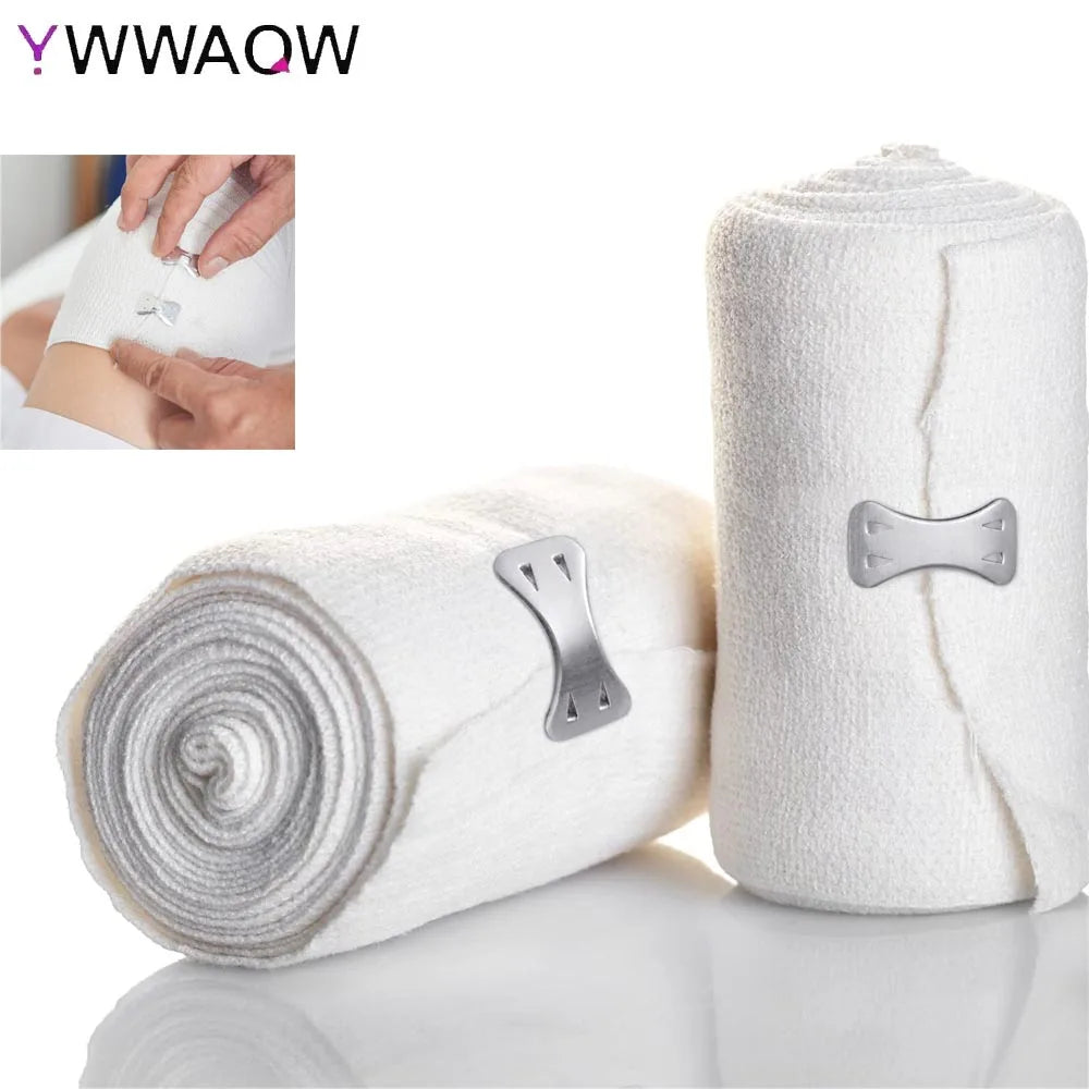 A roll of white elastic compression bandage with silver fasteners shown next to a hand applying it.