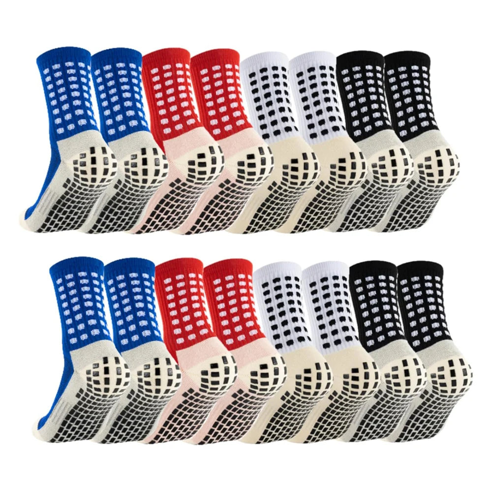 8er-Pack rutschfeste Silikonfußballsocken in verschiedenen Farben, darunter blau, rot und schwarz.