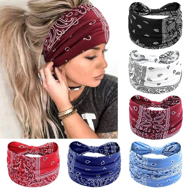 A collection of boho printed wide knotted headbands in red, black, white, and blue.