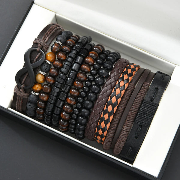 A collection of vintage beaded leather bracelets for men displayed in a white box.