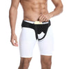 A muscular person wearing a black hernia support belt over white athletic shorts.