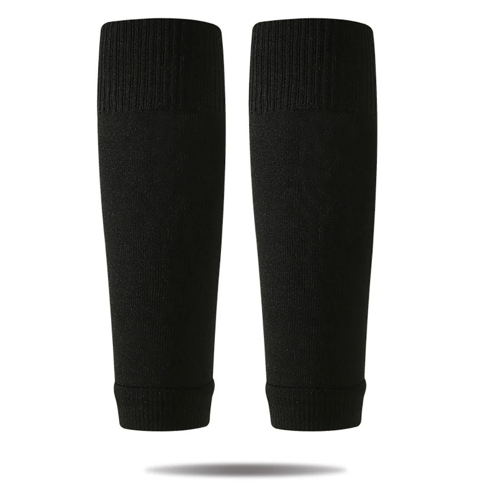 A pair of black professional compression soccer and sports sleeves.