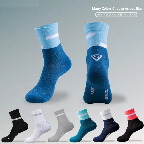 A variety of blue and gray performance athletic running socks displayed in different colors and styles.