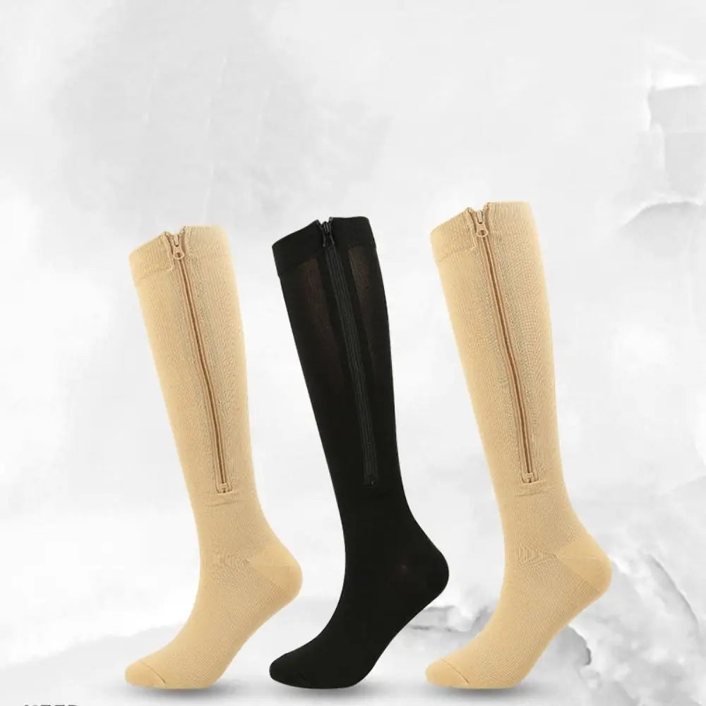 A set of beige and black high elasticity compression socks displayed against a white background.