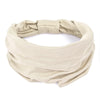 A beige non-slip elastic headband tied in a bow, suitable for fitness or hair