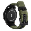 A black smartwatch with a green nylon quick release watch band is shown on a white background.