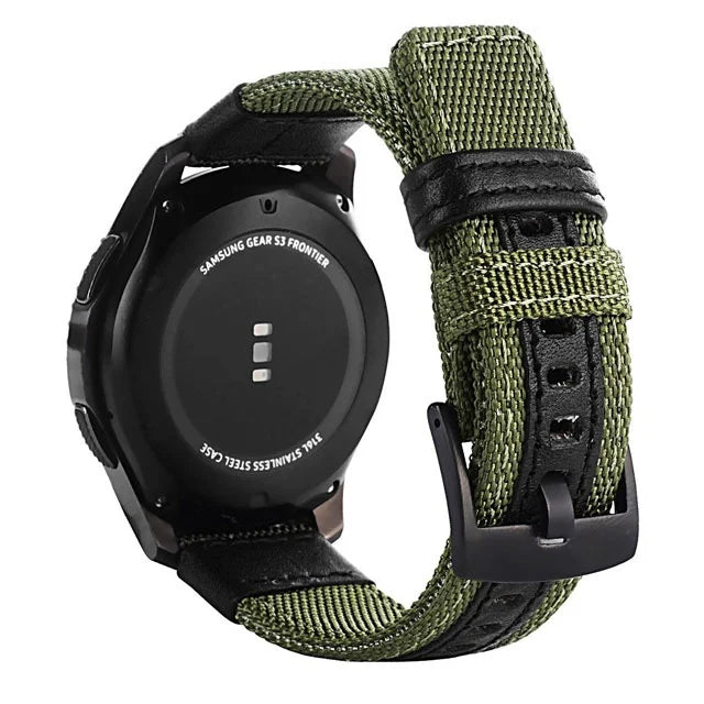A black smartwatch with a green nylon quick release watch band is shown on a white background.