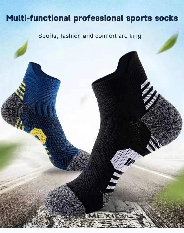 A pair of multi-functional professional sports socks in blue and black are shown on a surface.
