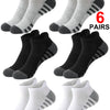 Six pairs of gray and black athletic running socks displayed in various colors and patterns.