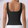 Black racerback padded tank top worn by a woman, shown from the back.