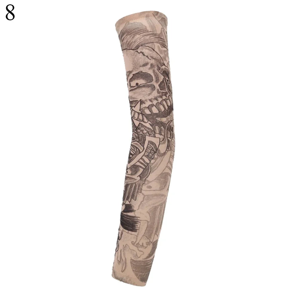 A close-up of a tan arm sleeve featuring an engraved skull design.