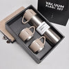 A set of three 500ml stainless steel vacuum flasks in a black box with a black lid.