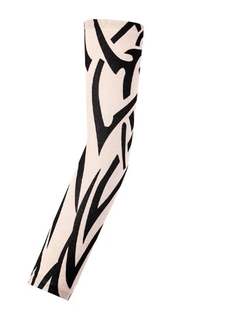 A long seamless tattoo sleeve featuring a black tribal pattern on a beige background.